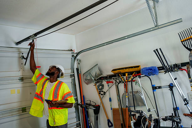 Professional Garage Door Panel Replacement technician working in Rome, NY